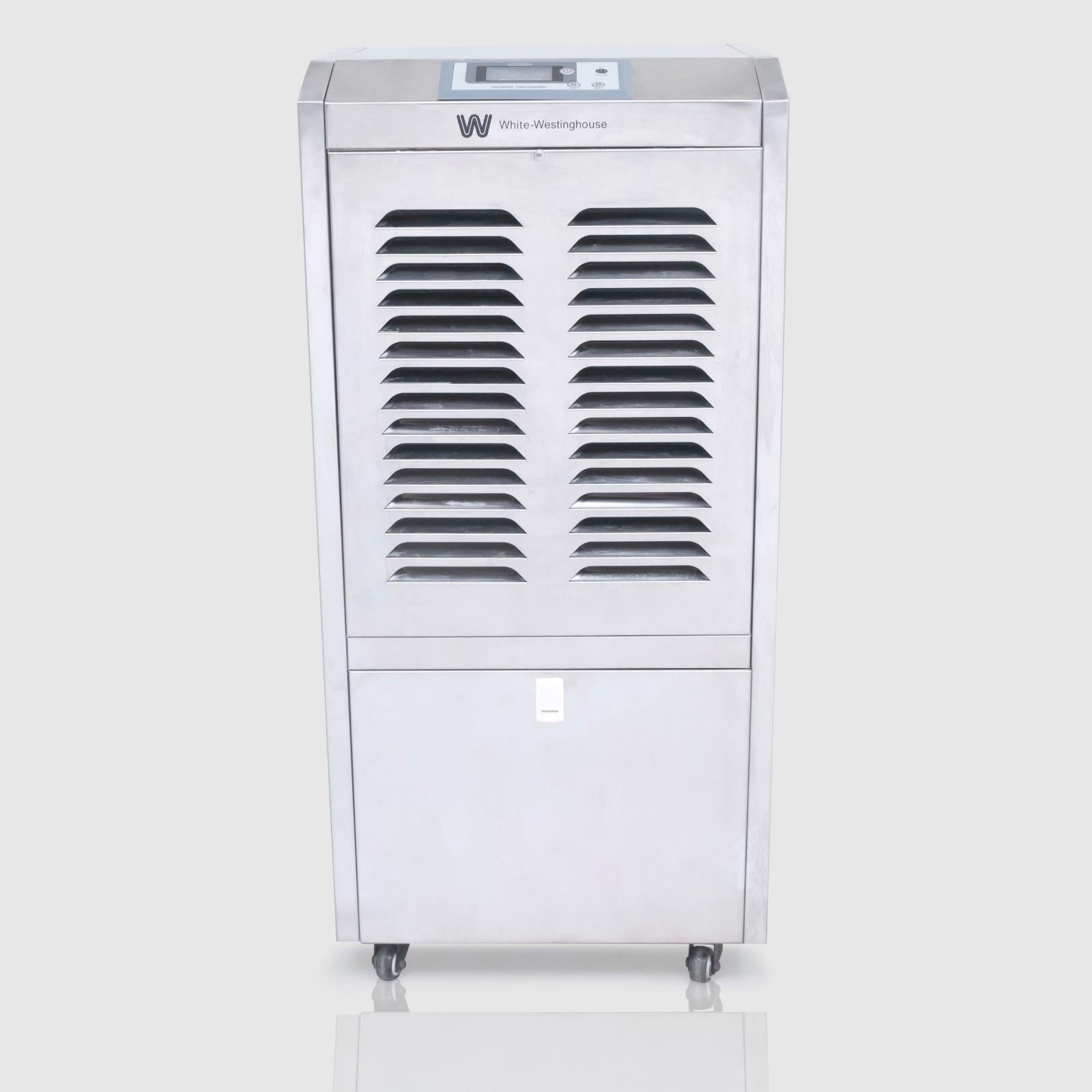 A White-Westinghouse commercial dehumidifier with a metallic silver exterior. The unit features a series of angled ventilation slats on the top section and a solid panel on the bottom section. The branding "White-Westinghouse" is visible at the top. The dehumidifier is mounted on small wheels for easy mobility and has a capacity of 110 liters, suitable for covering 11,000 cubic feet.