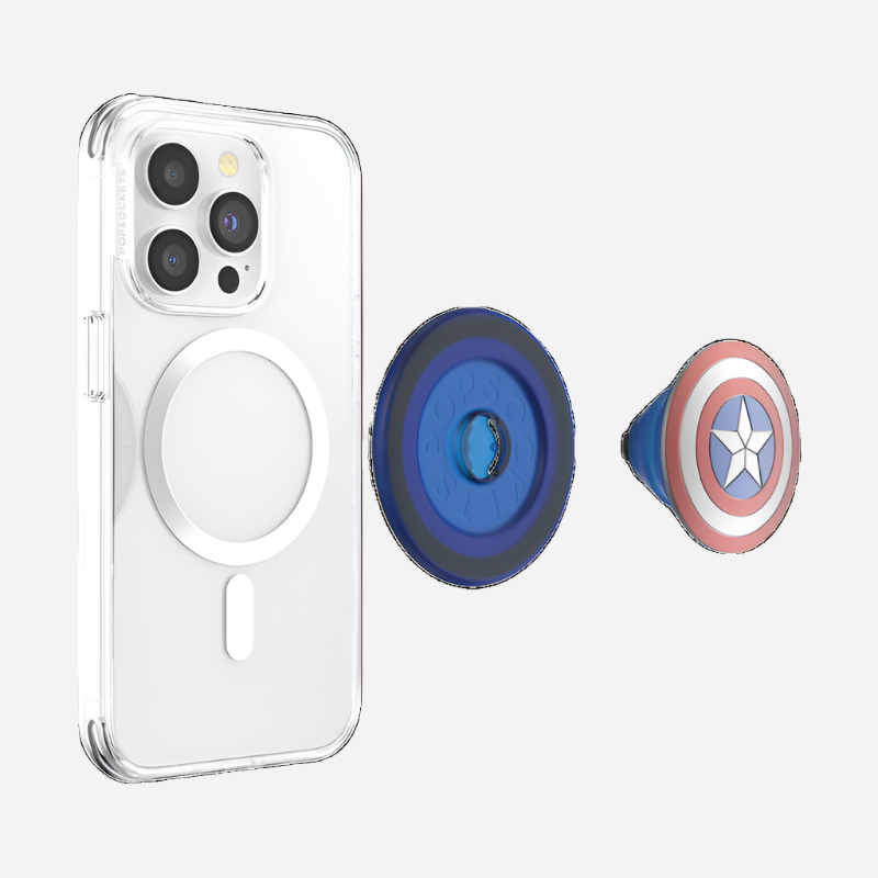 Clear smartphone case with an empty MagSafe ring attached to the back, shown alongside a detached Enamel Captain America PopGrip for MagSafe. The PopGrip, styled like Captain America's shield with concentric red, white, and blue circles and a white star in the center, is positioned to the right of the case. The PopGrip base is blue. The items are displayed on a white background.