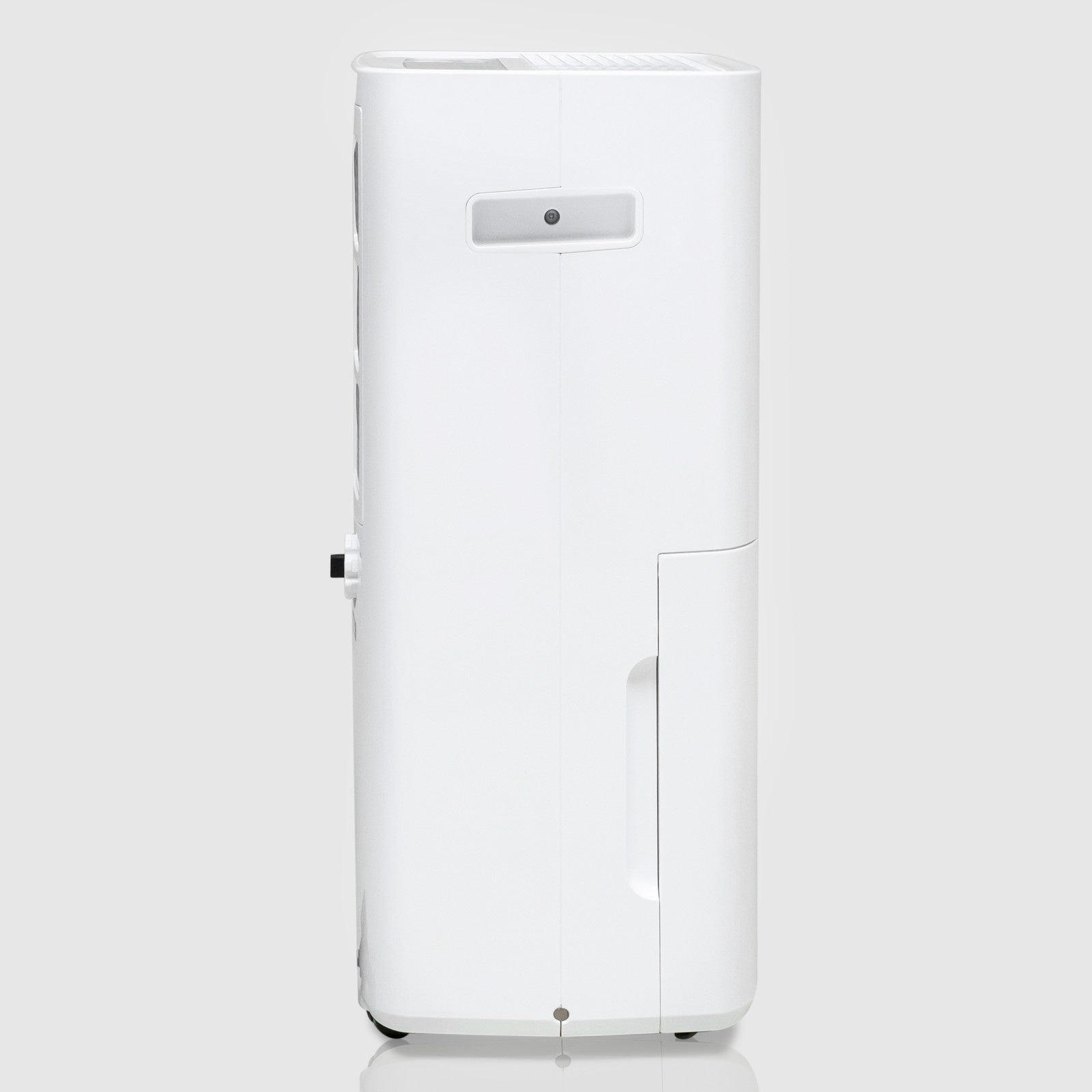A side view of a white dehumidifier, showing its sleek and narrow profile. The side panel includes a handle for easy carrying and a small access door for maintenance. The device is on small wheels for easy mobility.