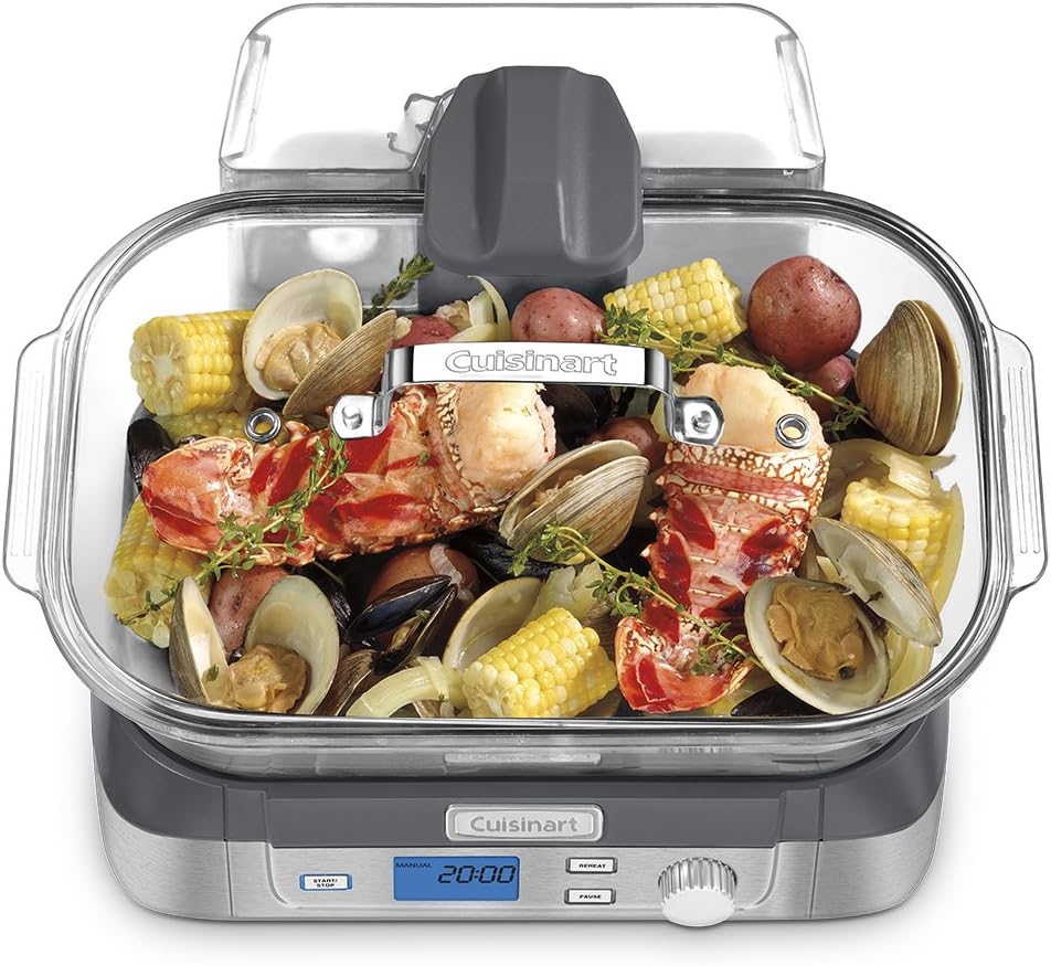 Close-up of the Cuisinart STM-1000 glass pot steaming lobster, clams, corn and vegetables