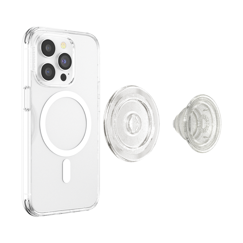 A smartphone with a clear case is shown next to a disassembled PopSockets Clear Glitter PopGrip for MagSafe. The phone's back displays the MagSafe alignment ring, indicating its compatibility with MagSafe accessories. The PopGrip is separated into two parts: the round base with the PopSockets logo and the extendable grip with a clear, glittery finish. The clear case allows visibility of the phone's details and the MagSafe ring, highlighting the PopGrip's stylish and functional design