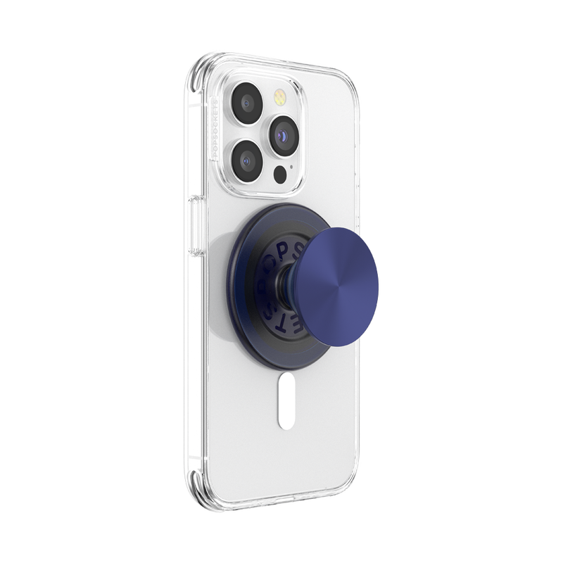 A smartphone with a clear case is shown with a French Navy PopGrip for MagSafe attached to its back. The PopGrip is extended, showcasing its functional grip, with a glossy, slightly reflective navy blue surface. The phone's camera lenses are visible at the top, highlighting the PopGrip's sleek and modern design, which complements the phone's aesthetics while providing a practical grip for easier handling.
