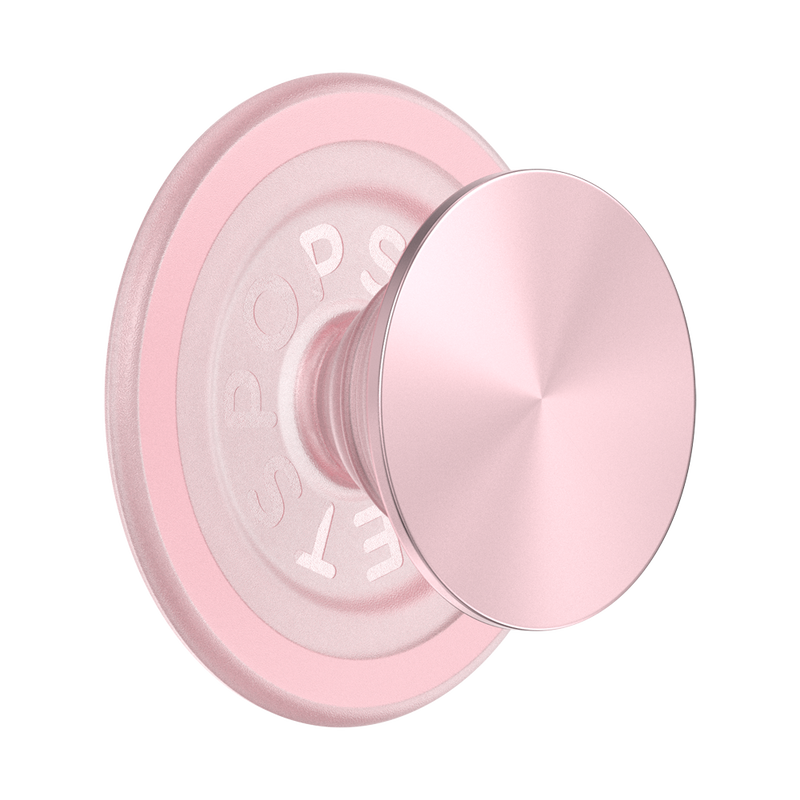 A PopSockets MagSafe PopGrip in dusty rose color is shown against a plain background. The grip features a round, flat surface with a glossy, slightly reflective finish and the PopSockets logo embossed on the inner ring. The soft pink color gives the PopGrip a sleek and modern appearance. The design allows for easy attachment and removal from a MagSafe-compatible device.