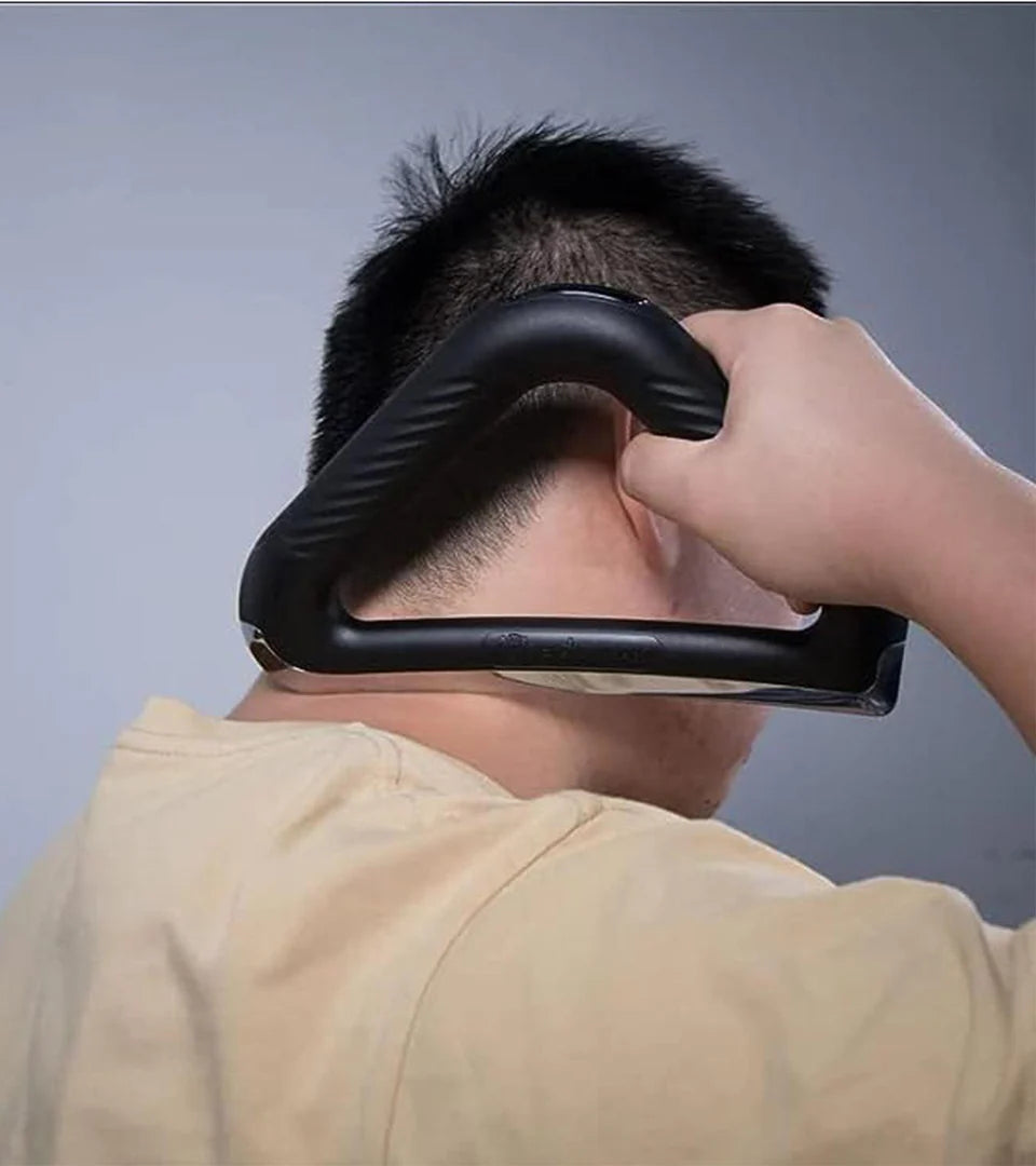 A person using a triangular massage tool with a textured grip and ergonomic design to target neck and shoulder muscles, demonstrating its effectiveness for self-massage and relieving tension.