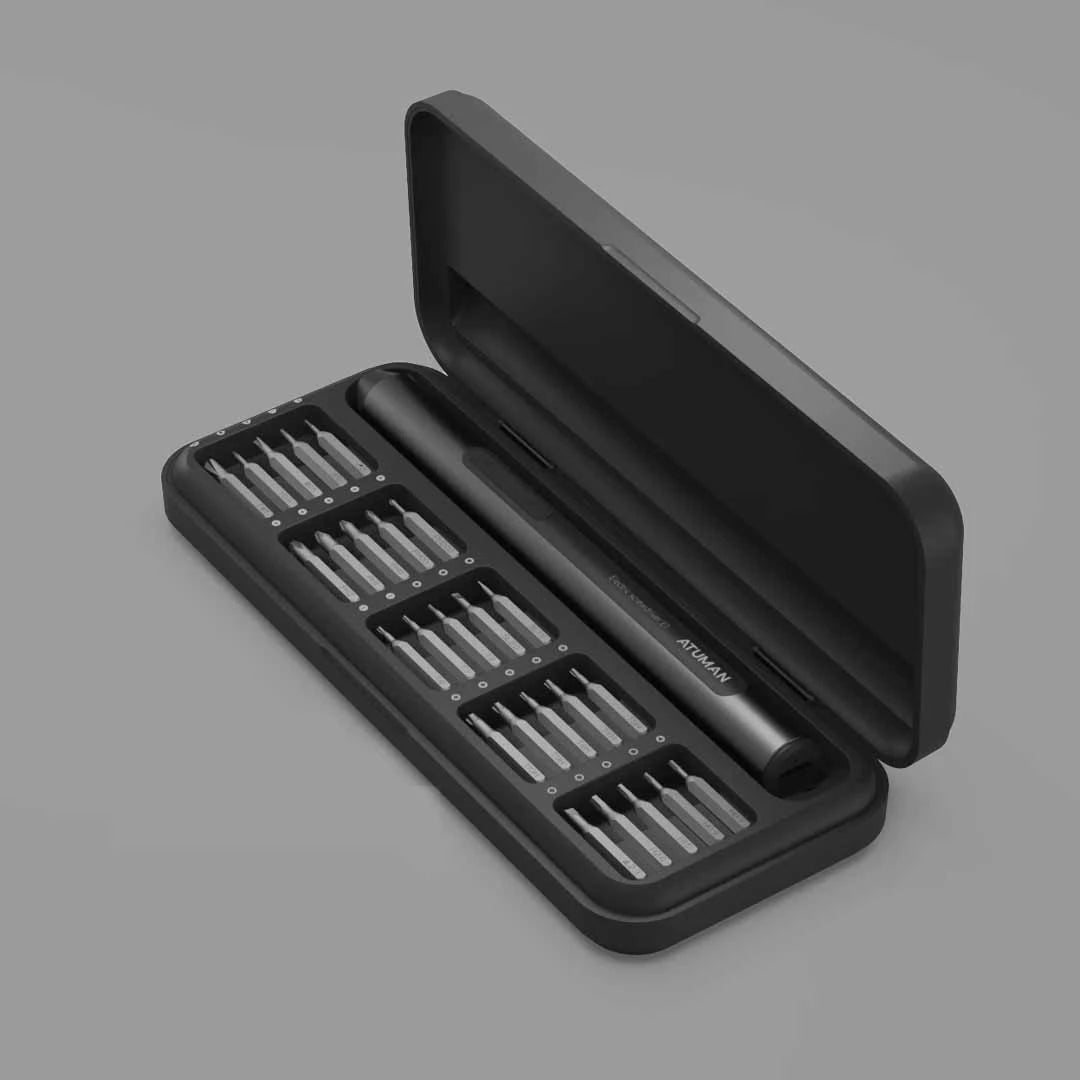 A sleek black tool kit opened to display various precision screwdrivers and bits. The kit includes a compact handle and multiple rows of different sized bits, organized neatly in a black plastic case with a lid
