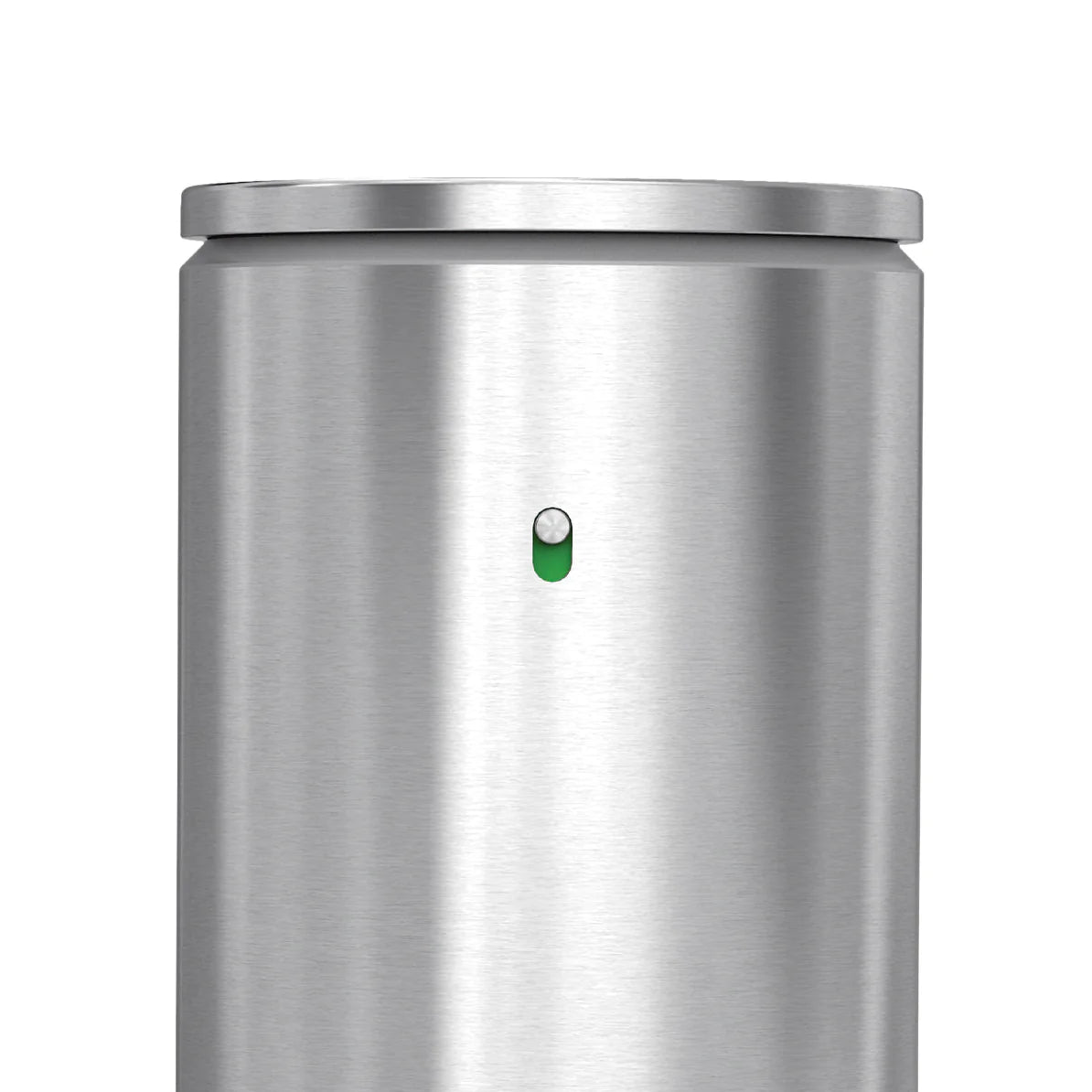 A close-up view of a stainless steel cylindrical container, likely a dispenser, with a sleek, brushed metal finish. The focus is on the front of the container, where a small, circular indicator light is visible, glowing green. The top edge of the container is slightly rounded, giving it a modern and minimalist appearance.