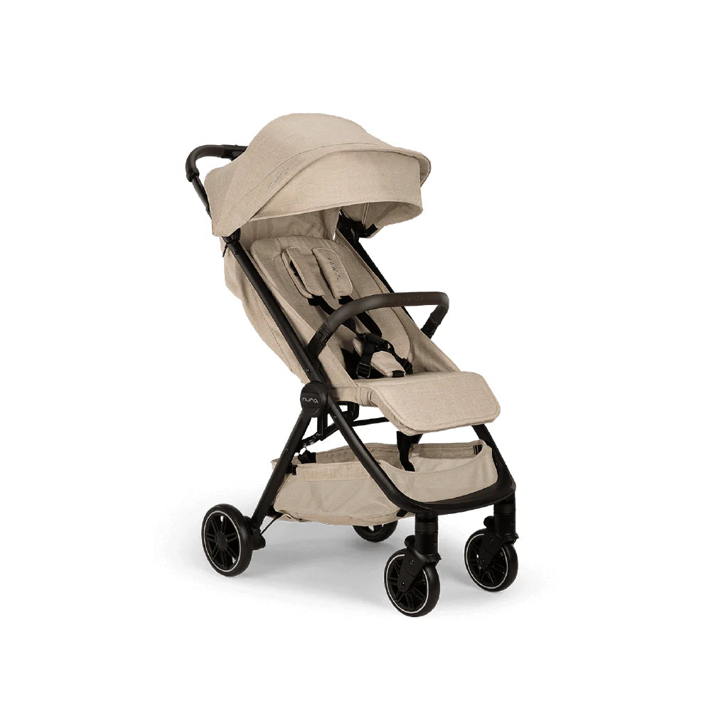 The image shows a beige compact stroller with a large canopy, cushioned seat, black arm bar and frame, and smooth-rolling wheels, designed for easy maneuverability and comfort.