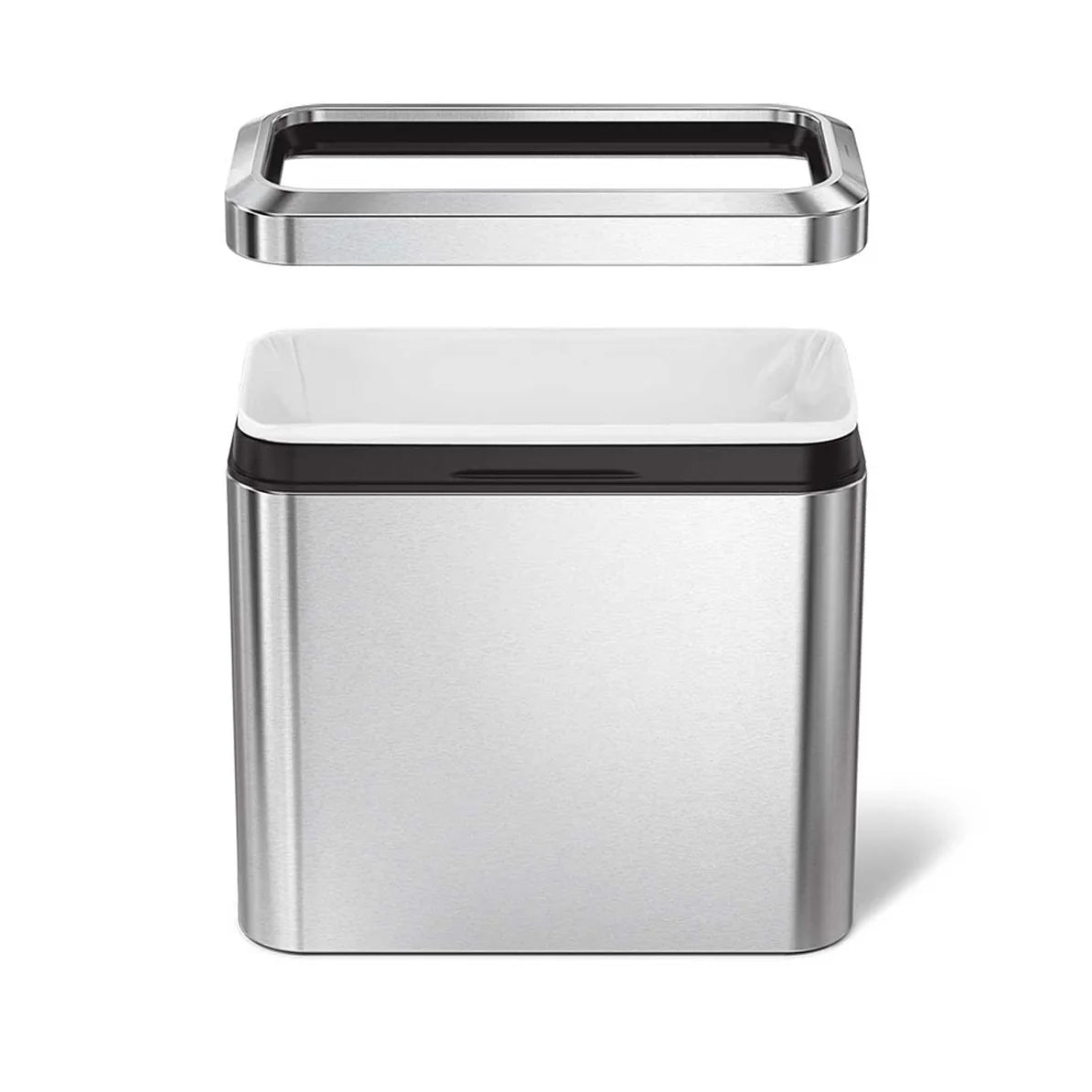 The image shows a sleek, rectangular stainless steel trash can with its lid removed and positioned above the can. The trash can features a polished finish with smooth, rounded edges and black accents around the top. The interior is lined with a white trash bag, neatly tucked inside. The removable lid has a modern design that fits seamlessly with the overall aesthetic of the trash can. This design is both functional and stylish, making it ideal for use in kitchens, offices, or other spaces where a clean and