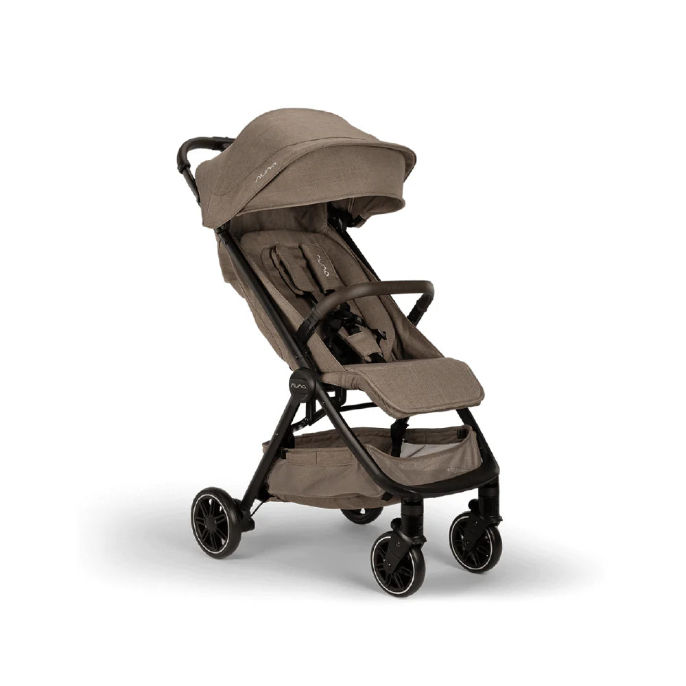 The image shows a compact stroller in a neutral beige shade with a canopy, cushioned seat, storage basket, and a removable arm bar, designed for everyday convenience and mobility.