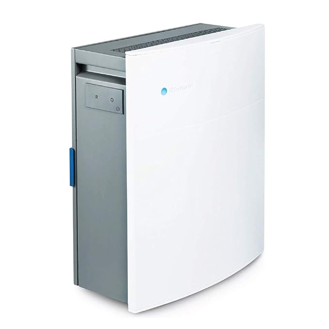 Side view of a Blueair air purifier featuring a sleek white and grey design with a top air outlet and side control panel.