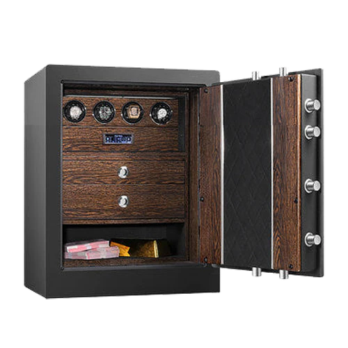 A luxurious watch safe stands open, revealing its elegant interior. The inside is lined with dark wood and features a row of watch winders, each capable of holding and winding multiple watches. Below the watch winders are two drawers with chrome knobs for additional storage.