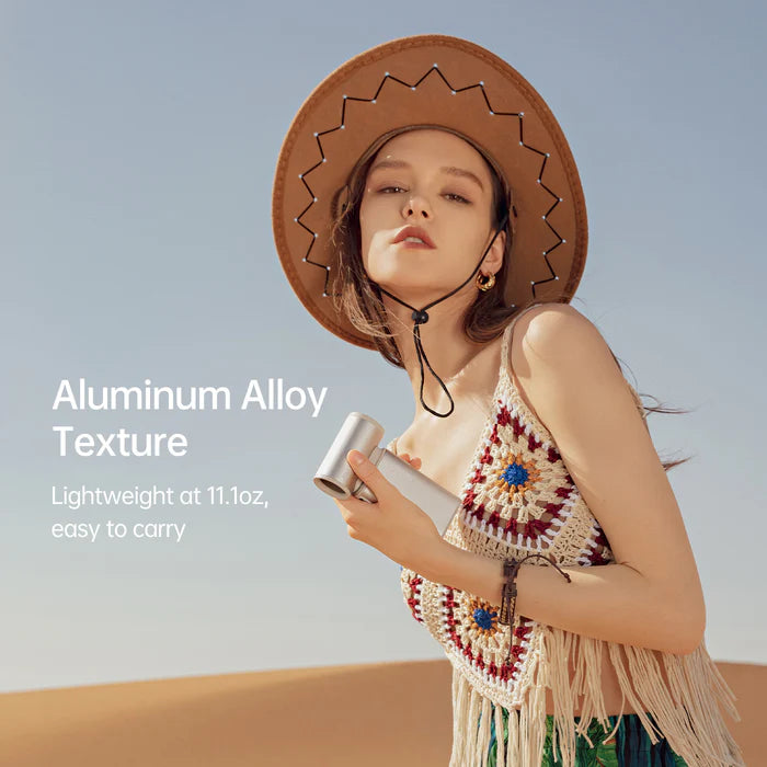 Jisulife mini fan with aluminum alloy texture, lightweight design at 11.1oz, ideal for easy carrying during outdoor activities.