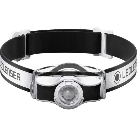 A white and black LED Lenser headlamp with an adjustable strap is shown from the front. The strap features the "LED LENSER" branding. The headlamp unit has a central clear lens and buttons for operation, designed for hands-free illumination. The design is sleek and modern, ensuring a secure and comfortable fit around the head.
