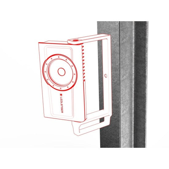 A diagram showing the LEDLenser portable light attached to a vertical metal beam. The light is highlighted in red, indicating its magnetic mounting capability, allowing it to be securely affixed to metal surfaces for hands-free operation.