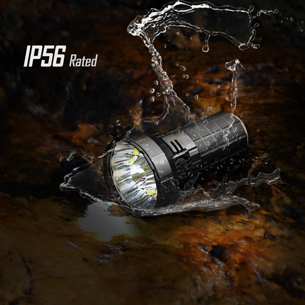 Image showcasing the IMALENT MS12 MINI flashlight being splashed with water, emphasizing its IP56 rating. The flashlight is positioned on a wet, rocky surface, with water droplets and splashes highlighting its waterproof and dustproof capabilities. The text "IP56 Rated" is displayed prominently on the left side of the image, indicating the flashlight's high level of protection against water and dust ingress, making it suitable for rugged outdoor use.