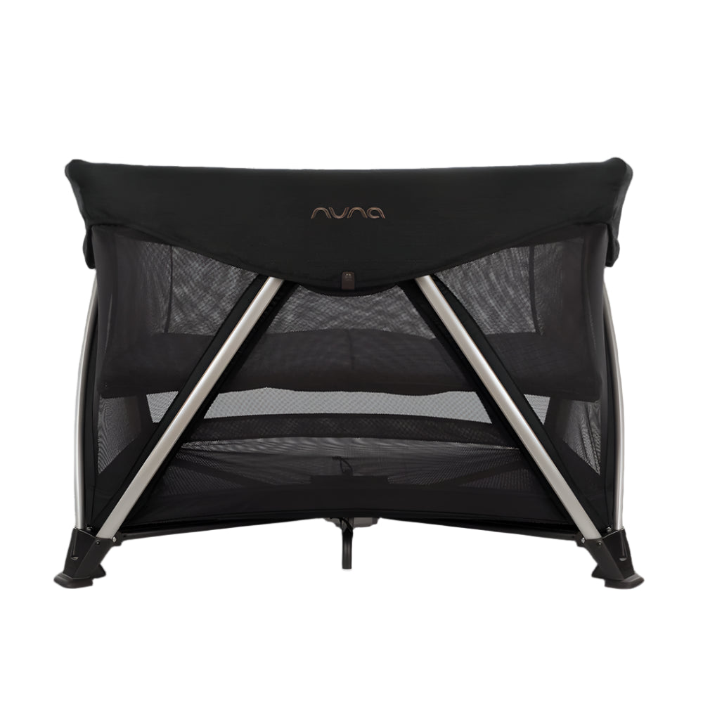 This Nuna travel crib features a mesh storage compartment below the sleeping area and a breathable mesh design for visibility and airflow, ideal for both rest and play.
