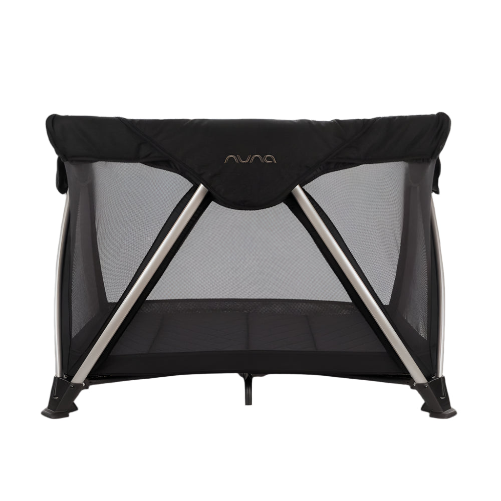 This is a Nuna travel crib or playard with a sturdy frame, breathable mesh sides, and a flat padded base, designed for safe and comfortable rest or play.