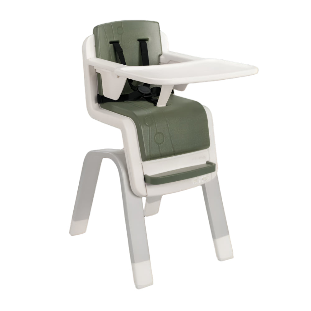 Nuna high chair in white and green with a five-point harness, adjustable tray, and footrest, designed for safe and comfortable feeding of infants and toddlers.
