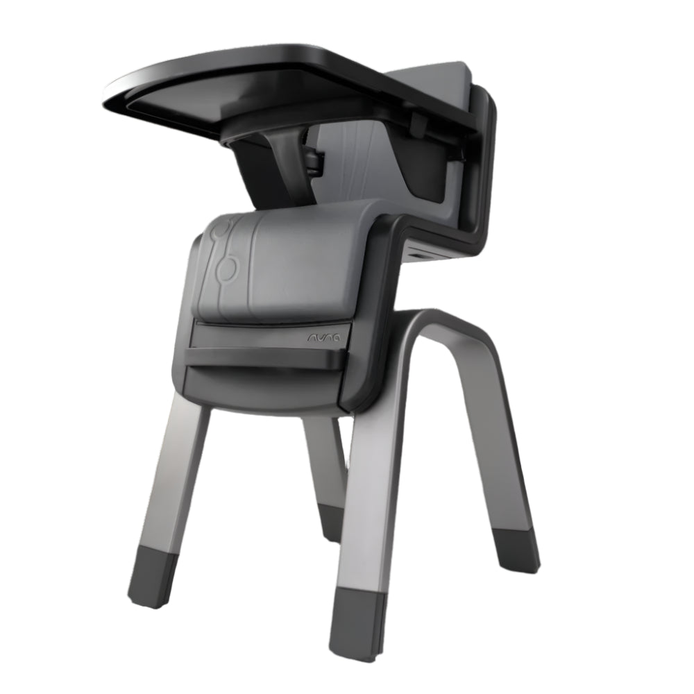 Low-angle view of a Nuna high chair in grey and black, showcasing its sturdy frame, contoured seat, and attached tray, designed for secure and modern feeding.