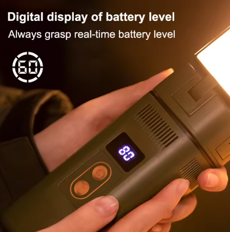 A close-up view of a portable light featuring a digital display showing "80%" battery level. The text above reads "Digital display of battery level: Always grasp real-time battery level," with a glowing light visible in the background.
