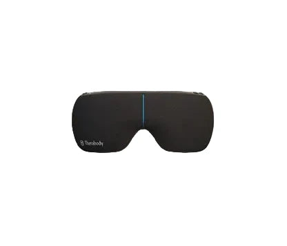 Black sleep mask with 'Therabody' branding on a beige background