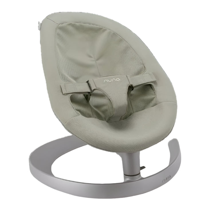 A modern beige Nuna baby rocker with a sleek curved base and safety harness, designed for soothing and comfort.
