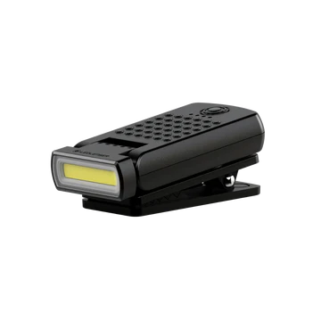 A compact black LED clip light with a rectangular design, featuring a long, narrow LED strip at the front, a textured grip area with raised dots, and a power button near the top. The attached clip allows for easy attachment to various surfaces. The side profile highlights the light's slim and portable design.