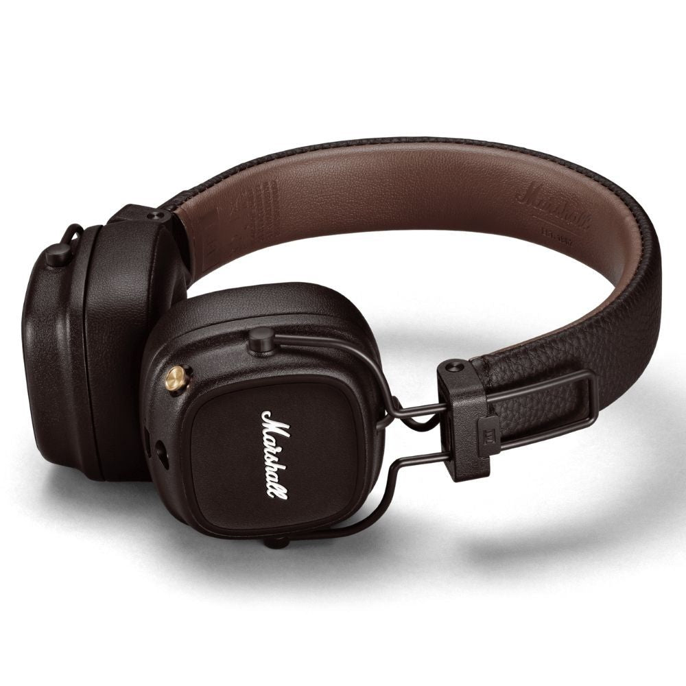 Marshall over-ear headphones featuring a classic black design with a textured finish and the iconic Marshall logo on the ear cup. The headphones have a sturdy, adjustable headband with a brown leather-like inner lining for comfort. The ear cups are cushioned for extended wear, and the gold accents add a premium touch. These headphones combine style with high-quality sound performance.
