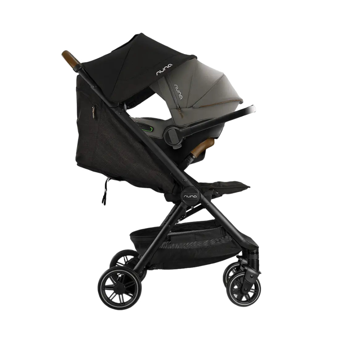 A Nuna baby stroller is shown with a matching Nuna infant car seat securely attached, both featuring a sleek black and grey design with sun canopies extended.
