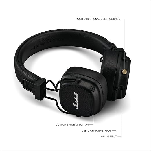 Marshall over-ear headphones with a sleek black design, featuring a textured finish and the iconic Marshall logo on the ear cup. The image highlights key features, including a **multi-directional control knob** for easy playback and volume adjustments, a **customizable M-button** for personalized settings, a **USB-C charging input** for fast charging, and a **3.5 mm input** for wired listening options. The headphones offer a blend of premium style and versatile functionality for an enhanced audio experience