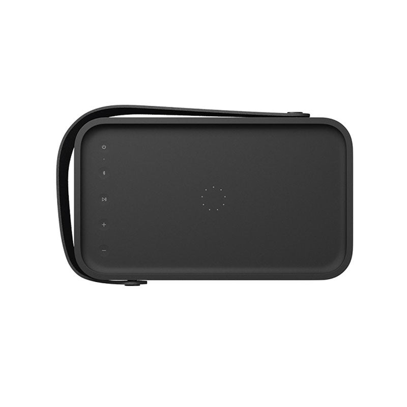 This image displays the **Bang & Olufsen Beolit speaker** from a top-down view. The speaker has a matte black surface featuring touch controls on the left side, including power, volume, play/pause, and Bluetooth connectivity. The iconic Bang & Olufsen circular indicator is positioned centrally. A sleek black leather strap is attached, adding to its portability and stylish design. The minimalist and functional layout highlights the speaker’s user-friendly interface, designed to complement its high-quality so