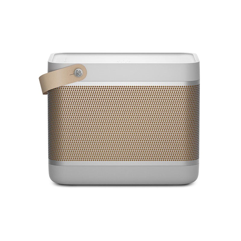 This image features a **B&O (Bang & Olufsen) portable speaker**, recognizable by its sleek and minimalist design. The speaker combines **neutral white and tan tones**, with a perforated front grille that likely enhances sound quality. It also features a **leather strap** on the left side, adding a convenient handle for carrying, emphasizing its portability. The **B&O branding** on the strap reinforces the premium audio quality and craftsmanship typically associated with the brand. This product likely appeal