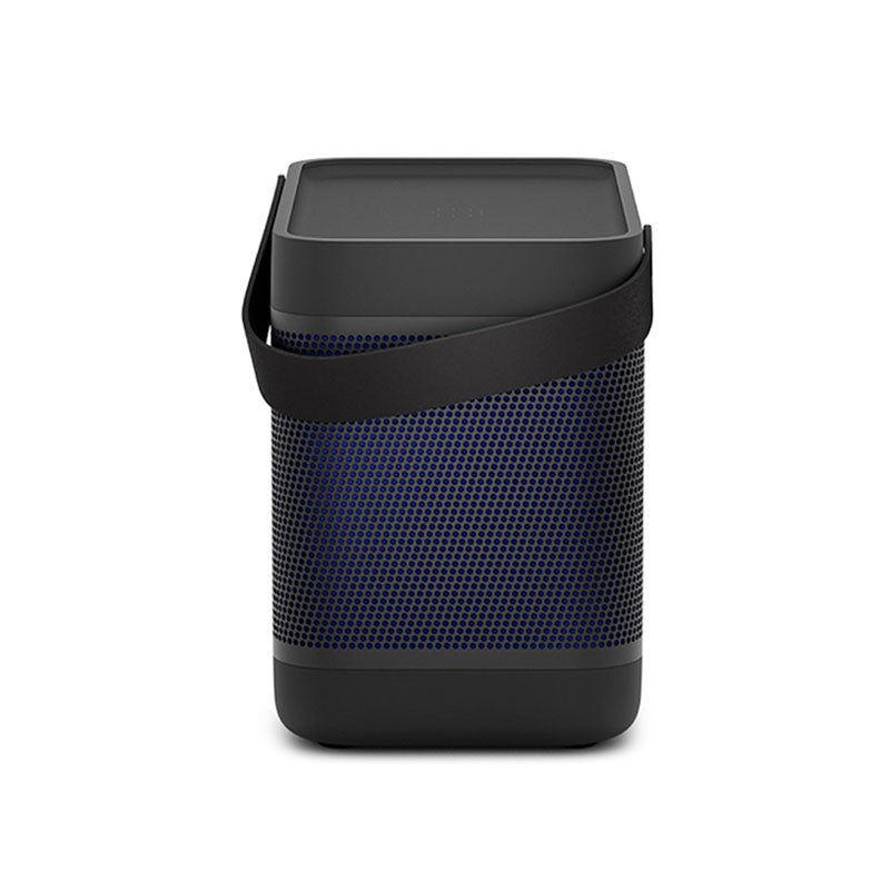 This image showcases the **Bang & Olufsen Beolit speaker** in the **black and navy blue** color scheme, displayed from a vertical perspective. The speaker’s sleek, minimalist design features a perforated navy grille on the sides, with the black leather strap elegantly wrapping around its body for portability. The matte black top complements the overall aesthetic, maintaining a modern, premium look. The speaker is renowned for delivering high-quality sound while offering easy mobility, making it a favorite a