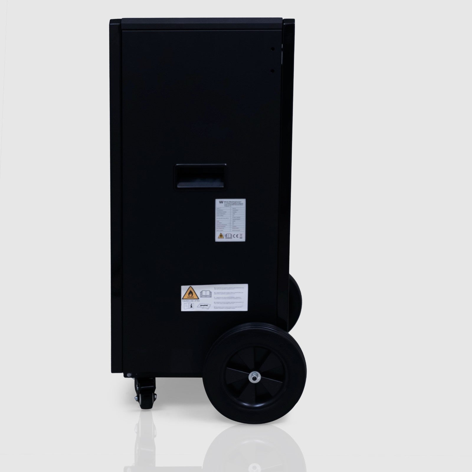 Side view of the White Westinghouse Industrial Dehumidifier WDE100, showcasing the large rear wheels and smaller front caster for enhanced mobility. The design includes a handle and labels for safety and operational information, making it suitable for large commercial and industrial spaces.