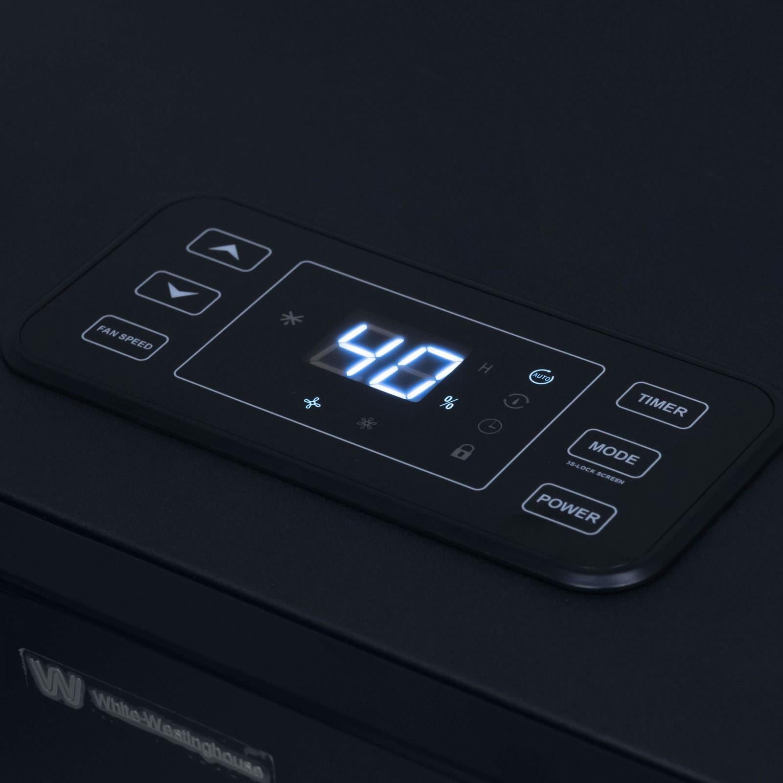 Close-up view of the illuminated digital control panel on the White Westinghouse Industrial Dehumidifier WDE100, showing a clear display and intuitive buttons for adjusting settings, mode, timer, and power. Ideal for precise humidity control in large commercial and industrial spaces.