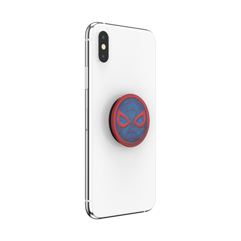 White smartphone with a PopSockets Marvel Spider-Man PopGrip for MagSafe attached to the back. The PopGrip features Spider-Man's mask design with red webbing details and red eyes on a blue background. The phone is shown from the back at a slight angle, highlighting the PopGrip.