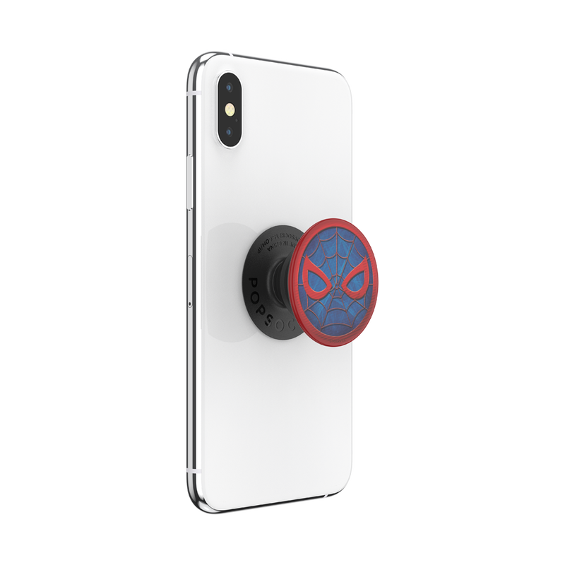  White smartphone with a PopSockets Marvel Spider-Man PopGrip for MagSafe attached to the back. The PopGrip features Spider-Man's mask design with red webbing details and red eyes on a blue background. The phone is shown from the back at a slight angle, with the PopGrip extended outward.