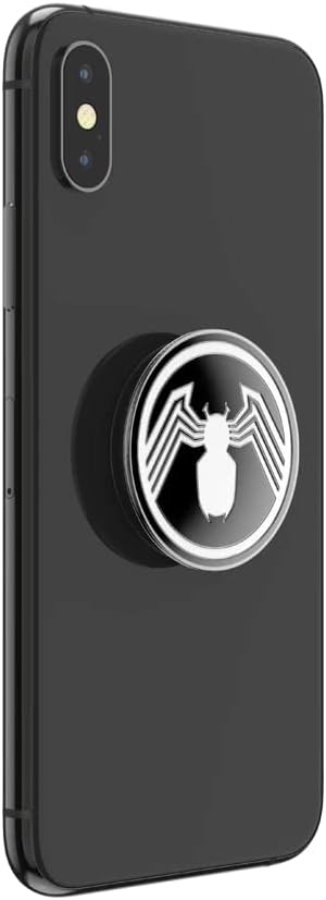  Black smartphone with a Marvel Enamel Spider-Man PopGrip attached to the back. The PopGrip features a black and white Spider-Man emblem with a stylized white spider on a black background. The phone is shown from the back at a slight angle, highlighting the PopGrip.