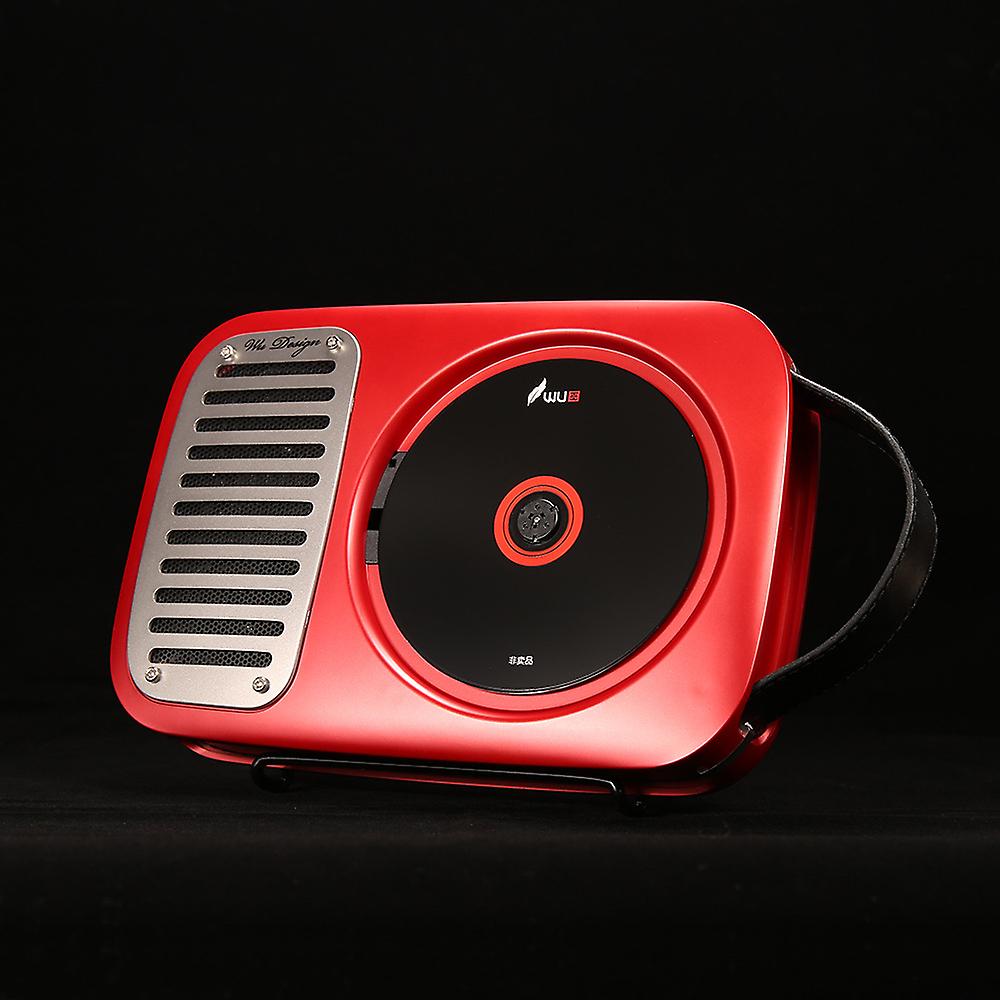  Portable CD speaker with a sleek red design, featuring a built-in CD player on the right side and a speaker grille on the left, equipped with a handle for easy carrying