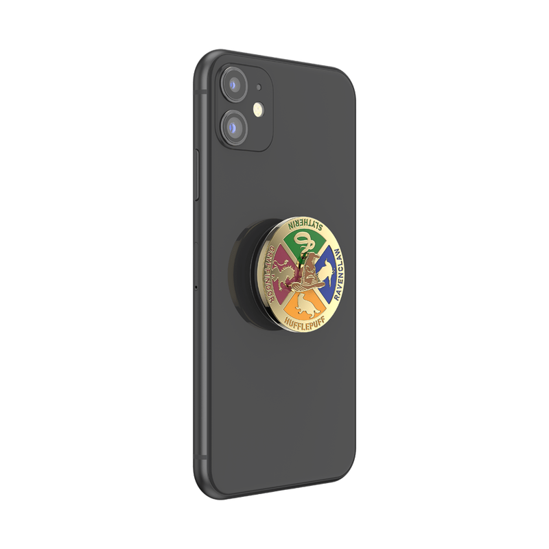 A black smartphone with a PopSockets Enamel Spinner featuring the Sorting Hat and the Hogwarts House crests attached to the back.