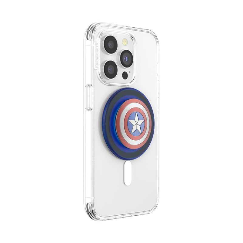 Clear smartphone case with an Enamel Captain America PopGrip for MagSafe attached to the back. The PopGrip features Captain America's shield design with concentric red, white, and blue circles, and a white star in the center. The phone is shown from the back at a slight angle, with the PopGrip extended outward.