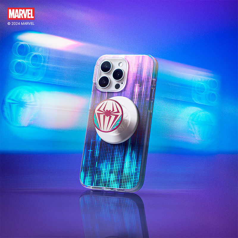 Smartphone with a holographic case featuring an Enamel Ghost Spider Suit PopGrip attached. The PopGrip has a round design with the Ghost Spider logo in purple and blue on a white base. The background is a vibrant, colorful gradient, adding a dynamic effect to the image.