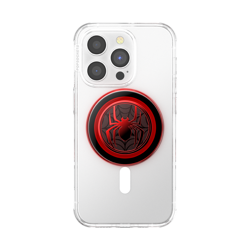 A clear smartphone case with a PopSockets Enamel Miles Morales Suit PopGrip for MagSafe attached to the back. The PopGrip features a red and black design with the Miles Morales Spider-Man emblem in the center, surrounded by a red ring and a web pattern background. The phone case shows the camera cutout and the MagSafe PopGrip positioned centrally on the back.