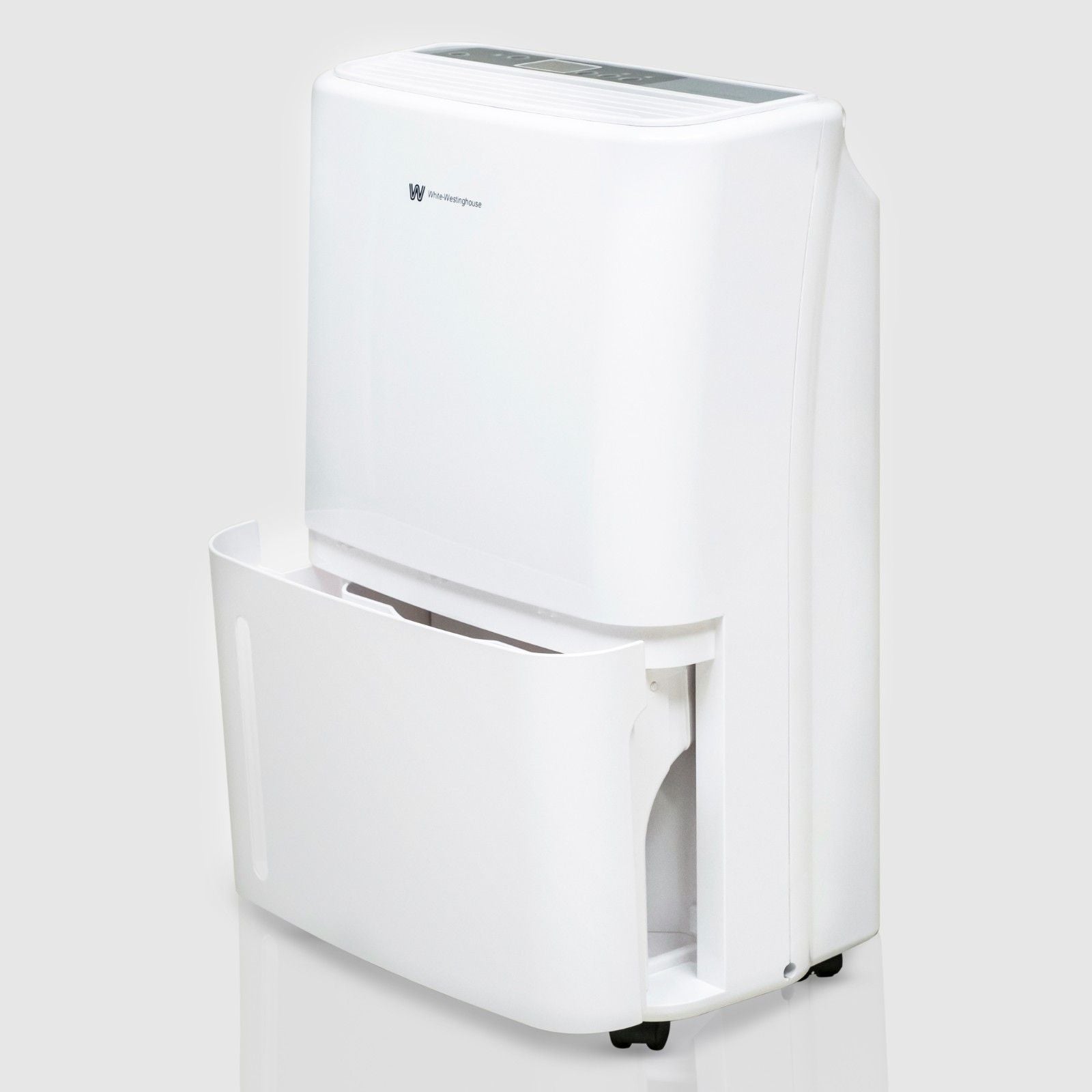 Angled view of the White Westinghouse Dehumidifier AWHD20L with the water tank partially removed, showcasing the sleek white design and easy access to the water tank for maintenance. The unit features casters for easy mobility, making it ideal for use in residential and commercial spaces to maintain optimal humidity levels.