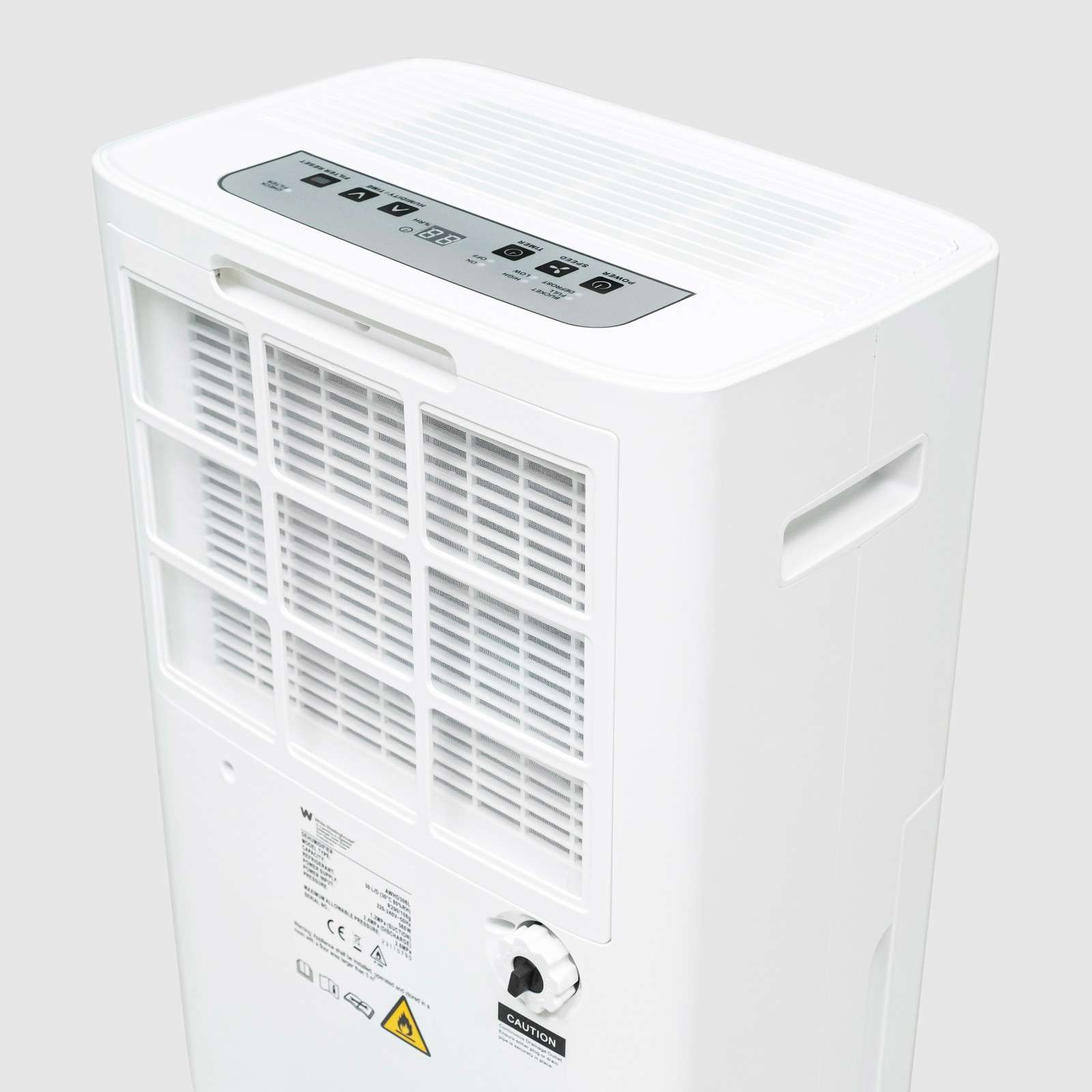 Top rear view of the White Westinghouse Dehumidifier AWHD306L, showcasing the control panel, air vent, and caution label for optimal functionality and safety awareness.