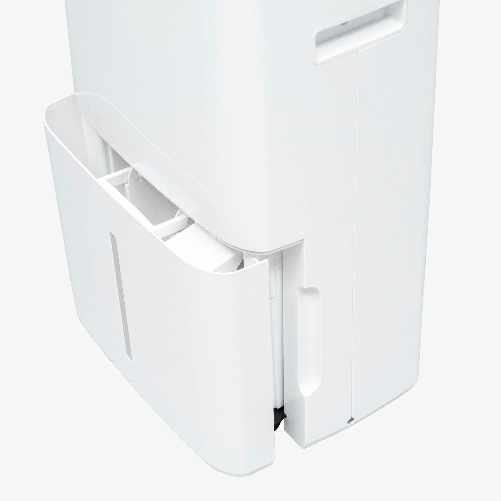 Close-up view of the water tank compartment of the White Westinghouse Dehumidifier AWHD306L, showcasing its easy-to-remove design for efficient water disposal and maintenance.