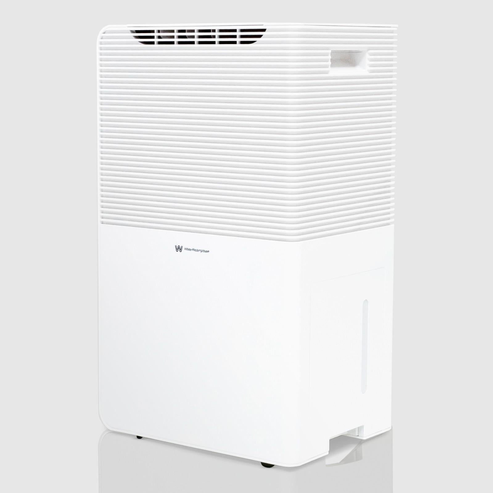Angled view of the White Westinghouse Dehumidifier AWHD40, showcasing the sleek white design with top air vents, built-in handle, and water tank compartment. The unit's modern and compact design is suitable for maintaining optimal humidity levels in residential and commercial spaces.