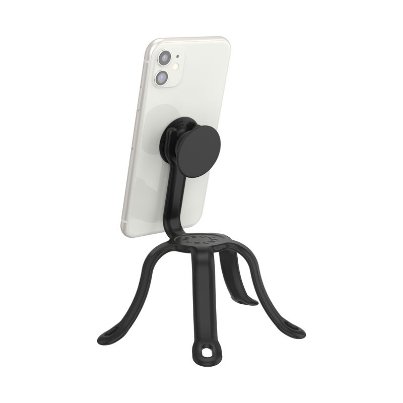 A white smartphone mounted on a PopSockets Flex Mount in black. The Flex Mount has a tripod-like design with three flexible legs that can be adjusted for stability and positioning. The phone is securely attached to the mount, which provides a versatile and convenient setup for hands-free use of the smartphone. The sleek black color of the mount contrasts with the white phone, highlighting the functional and stylish design.