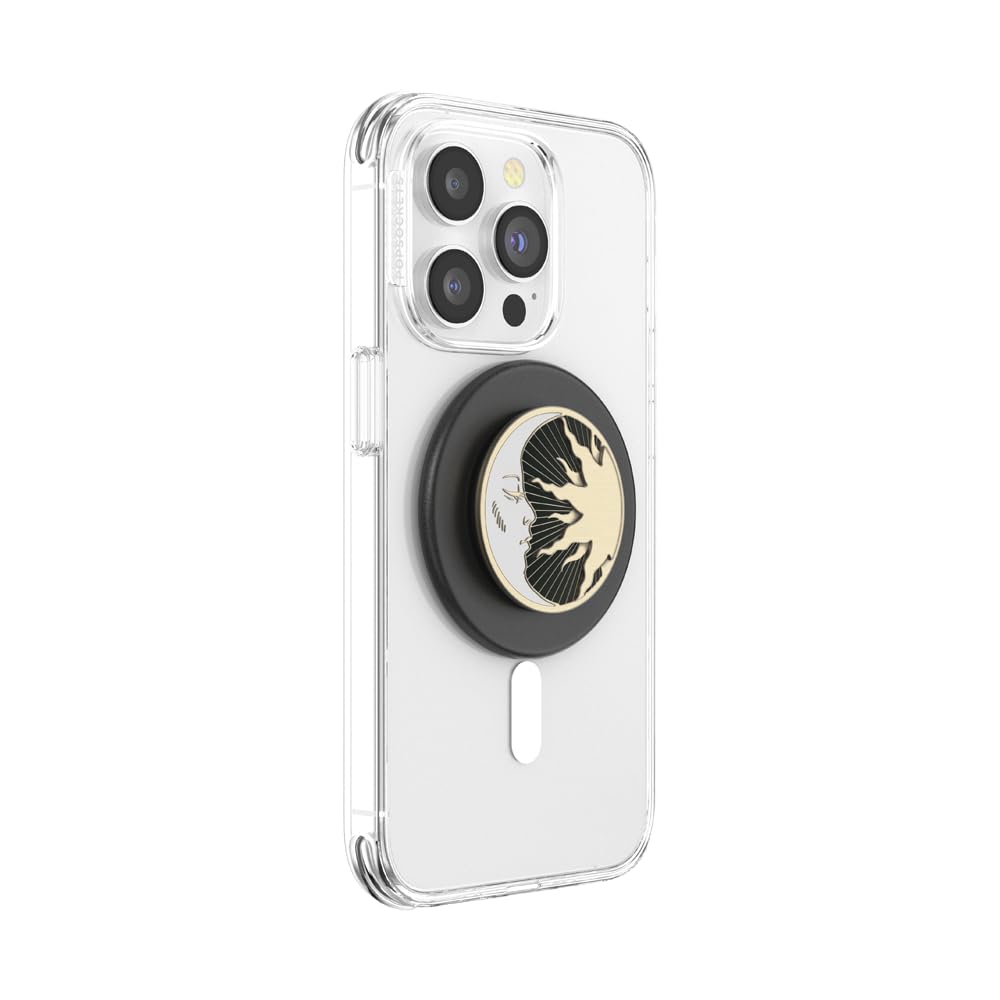 The image showcases a **clear phone case with a MagSafe-compatible black PopSocket base** securely attached to the back. A **gold and black celestial-themed PopSocket grip** is magnetically connected to the base, featuring an elegant sun and moon design. This stylish accessory enhances both the functionality and aesthetics of the phone, providing improved grip and convenience.