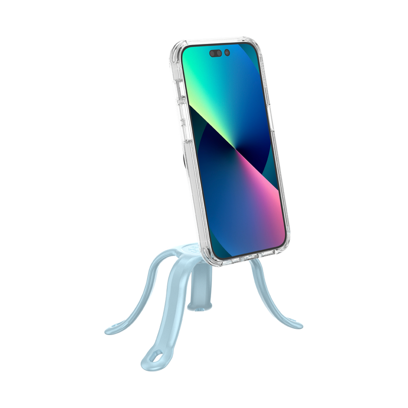  PopSockets Flex Mount in Blue Sigh color holding a smartphone with a colorful screen in a clear case. The mount's flexible legs are positioned to support the phone upright on a flat surface. The phone is shown from the front, highlighting the screen and the light blue colored flexible mount's design.